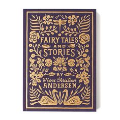 a blue and gold book cover with floral designs on the front, in gold foil