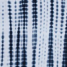 black and white tie dyed fabric with circles