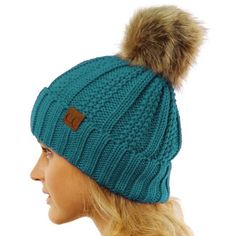 We are adding a little cold weather fun to our most loved C.C beanie. These pom beanies have an added pom on the top of them are lined on the inside. They are comfy, warm, and oh so cozy. The little leather tag is stamped with a registered C.C Size: One Size.  Color: Blue.  Gender: unisex.  Age Group: adult. Cc Beanie, Winter Hats For Women, Sherpa Lined, Pom Beanie, Chunky Knit, Cold Weather, Cloth Bags, Women's Accessories, Pom Pom