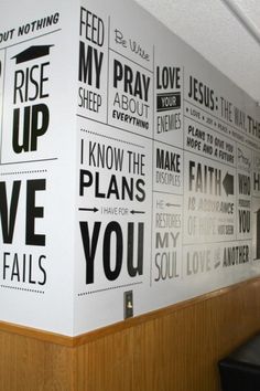 a wall that has some type of words on it with the words i love you in black and white