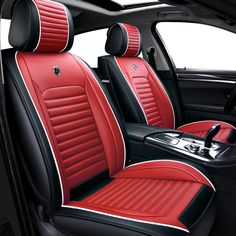 the interior of a car with red and black leather upholsters on it