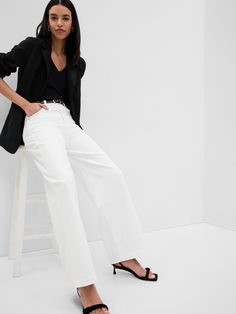 Fit: Fitted in the waist & hips with an ankle-length, relaxed wide leg.  Fabric: 99% Cotton, 1% Stretch.  Stretch: Low Stretch Jeans.  Our most comfortable authentic denim.  Holds you in at the hips & waist but feels easy everywhere else.  Rise: High Rise Jeans.  Look: A classic five-pocket jean in a white wash.  Details: Zip fly & five-pocket styling.  Responsibly Made: This pair of jeans is part of our water-saving Washwell program.  Compared to conventional wash methods, Washwell has saved mi Gap Chic Bottoms With Relaxed Fit, Chic Gap Bottoms With Relaxed Fit, Gap High Rise Pants For Spring, Trendy Gap Wide Leg Bottoms, Gap High Waist Jeans For Spring, Chic Gap Bottoms For Spring, Chic Spring Bottoms From Gap, Gap Casual Jeans For Work, Gap High Rise Jeans For Work