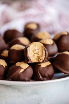 chocolate covered peanut butter balls on a plate