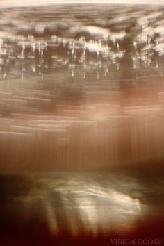 an abstract photograph of water and sand