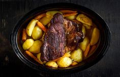 a pot roast with potatoes and carrots