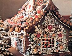 a close up of a gingerbread house made to look like it has been decorated