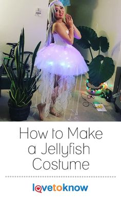 a woman dressed as a jellyfish costume standing in front of a plant with the words how to make a jellyfish costume