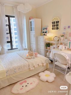 the bedroom is decorated in pastel colors