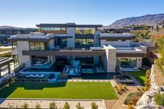 an aerial view of a modern home in the desert