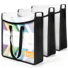 three black and white shopping bags with handles on each side, one for the 3 pc's