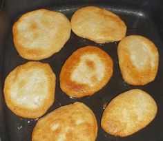 some food is cooking in a pan on the stove