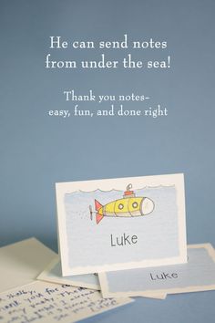 a card with an image of a yellow submarine and the words luke written on it