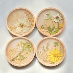 Coasters are sold by piece, with prices ranging from $21 (1 piece) to $58 (set of 4) Handmade floral coasters with beech wood, epoxy resin. Flower: White Rose, Yellow Pyrethrum, Etc.  These coasters capture the essence of these botanical wonders, making them a delightful addition to any home. Each coaster in this set is meticulously crafted from sustainably sourced beech wood, ensuring durability and a touch of rustic charm. The white rose and yellow pyrethrum designs, carefully preserved in res Floral Coasters, Rose Beautiful, Wood Epoxy, 2024 Ideas, Epoxy Resin Crafts, Housewarming Present, Flower White, Beautiful Home Decor, Cup Coaster