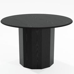 a round table with black wood grained finish on the top and base, viewed from the front