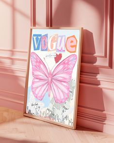 a pink butterfly is sitting on the floor in front of a sign that says voque