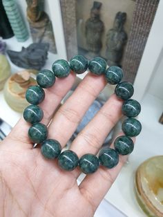 The perfect gift idea for your man; 16 pcs glossy, speckled, deep green Jade beads in Elastic Beaded Bracelet. All Type A natural Jadeite (non-bleached, non-dyed, non-treated materials), 14 mm size. Bracelet size 17 cm to 18 cm, weighs around 65 grams. Price posted is for one bracelet only. Affordable Green Hypoallergenic Bracelets, Cheap Themed Green Bracelets, Cheap Hypoallergenic Green Bracelets, Cheap Traditional Green Beaded Bracelet, Cheap Traditional Green Beaded Bracelets, Cheap Green Novelty Bracelets, Gents Bracelet, Jade Bracelet, Jade Beads