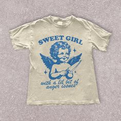 Sweet as an angel, but don't test the temper! This is our unisex shirt, and it's true to size. To get the oversized look, you have to choose +1 or +2 of your original size number. If you're not sure about your size, you can refer to our size chart. Reach out if you have any issues with your order! The Unisex Garment-Dyed Heavyweight T-Shirt | Comfort Colors 1717 is the go-to choice for those who appreciate a structured-fit shirt, made from a thick but breathable material. The 100% cotton fabric Fitted Vintage T-shirt With Funny Print, Biblically Accurate Angel Shirt, Angel Tshirt Psttersns For Kids, Vintage Funny Print Short Sleeve T-shirt, Angel T-shirts, Aesthetic Angel, Angel Shirt, Anger Issues, Graphic Tees Vintage