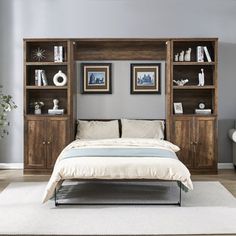 a bed sitting in a bedroom next to a book shelf