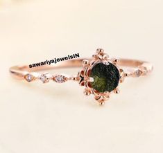 Moldavite ring 925 sterling silver jewelry, Moldavite Ring, 925 sterling silver, jewellery* Natural moldavite Ring, Authentic Raw Moldavite, Handmade Ring, Christmas , Moldavite Ring, Unique Moldavite Ring, meteorite ring, Stunning Moldavite Ring, Ring, Czech Moldavite, Brass Moldavite Ring, Loose gemstone Rings, Moldavite, Elegant Moldavite Handmade item Dispatches from a small business in India Materials: Gold, Rose gold, Silver, Stone Gemstone: Moldavite Raw stone Gem colour: Green Band colour: Silver Style: Minimalist Recycled Material - Moldavite Gemstone and 925 Silver Size - Customization Available Use - Gift for Loved Once, Anniversary Gift  Care - Don't get it Wet, Clean with Soft Cloth Moldavite Wedding Ring, Moldavite Engagement Ring, Moldavite Ring, Meteorite Ring, Ring Unique, Ring Ring, 925 Sterling Silver Jewelry, Rings Statement, Unique Rings