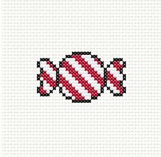 a cross stitch pattern with two red and white candy canes on the front side