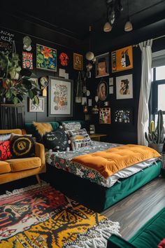 a bedroom with black walls and lots of pictures on the wall