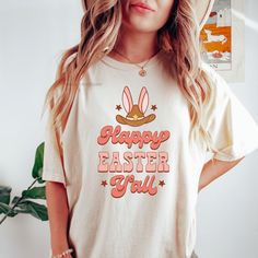 "Cute Happy Easter Y'All Retro Easter Shirt, Funny Western Easter Shirt Women, Easter Gifts, Vintage Inspired Tee, Easter Vibes, Country Our adorable western Easter shirt makes the perfect addition to all of your fun activities this Easter holiday!  This shirt is made of 100% high quality comfort colors® tee making it perfect for the warmer temps. You will love it! This is a unisex tee so it does run a little big so we ask that you please be sure to check sizing and measurements in the photos se Kids Candles, Funny Easter Shirt, Easter Vibes, Retro Easter, Country Tees, Easter Tees, Funny Easter, Gifts Vintage, Easter Humor