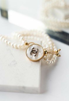 Jennie Chanel, Moda Chanel, Pearl Strand, Classy Tattoos, Pearl Strands, Vintage Pearls, Strand Bracelet, Hand Crafted Gifts, Jewelry Inspo