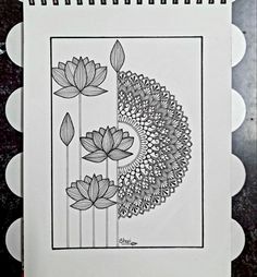 a black and white drawing of flowers on paper