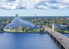 an aerial view of a bridge over a body of water