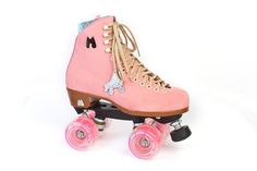 pink roller skates with wheels and laces on the bottom one has a horse design