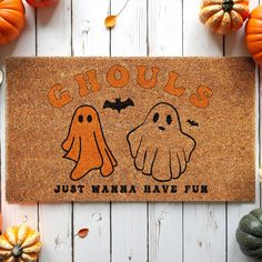 a door mat with two ghost faces on it and the words chuck's just wanna have fun