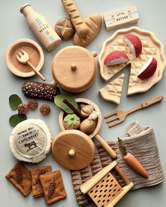 an assortment of wooden toy food items on a gray background with the words, old parker