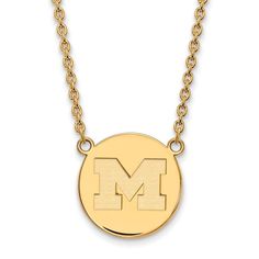 If You Are A Fan Of The University Of Michigan And The Wolverines Then You Need To Show Your School Spirit With This University Of Michigan Necklace. We Are A Certified Retailer And This Authentic Item Is Officially Licensed. It Is Crafted From 14k Yellow Gold Plated Sterling Silver And Crafted In The Usa. 18 Inches In Length. Black Bow Item Number: N12575 Christmas Tree Charm, Michigan University, Tiny Charm, Large Necklace, Round Pendant Necklace, Bow Jewelry, Letter M, University Of Michigan, Disc Necklace