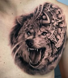 a man's chest with an image of a wolf in the middle of it