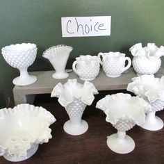 Choice of vintage Fenton milk glass bowls or vase from the Options drop down menu 1. Hobnail Epergne bowl ONLY no HORNS--3 1/4" x 8" 2. Creamer & sugar Set -- about 3" high x 3 1/4" star shape (24-3698) 3.  Vase 5" high- ruffled edge-- 5" diameter (7332) 4. Hobnail pedestal-- 5 1/2" high x 5 1/2" ruffled top. (24-3699) 5. compote lined pedestal 5 5/8" high x 6 1/2" top diameter 24-4365)(25-4653 6. Bowl lined pedestal 4 3/4" high x 4" scalloped diameter (24-3700) 7. Silvercrest fan vase 4" high x Decorating With Milk Glass Ideas, Decorating With Milk Glass, Antique Kitchen Gadgets, Vases Antiques, Milk Glass Decor, Milk Glass Collection, Milk Glass Bowl, Fenton Milk Glass, Nut Bowl