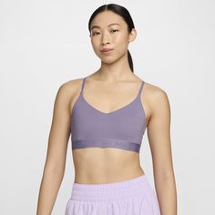 Don't let anything get in the way of expressing yourself in this sleek, low-profile sports bra. Its light support gives you a gentle hold with plenty of freedom that's great for low-impact workouts or all-day comfort. Smooth, quick-drying fabric gives the bra a clean finish so you can wear it your way. Nike Bras, Expressing Yourself, White Sports Bra, Nike Sports Bra, Low Impact Workout, Women Lifestyle, Nike Sports, Indie Fashion, Black Sports Bra