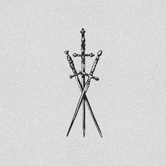 two crossed swords are on top of each other