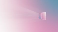 a pink and blue background with the windows logo on it's left side,