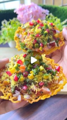 two small bowls filled with food on top of a table