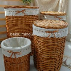 three wicker baskets with bows on them