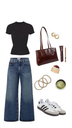 a woman in black shirt and jeans with accessories