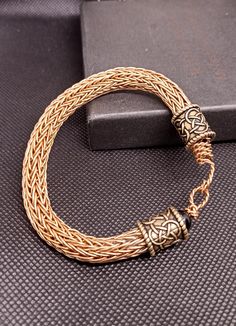 Double viking knitting bracelet with onyx. Material: bronze, natural onyx stone Length: 21.5 cm Thickness: 10 - 11 mm For wrists circumference: 17  - 19 cm Knitting Bracelet, Viking Knitting, Bronze Natural, Bracelet Viking, Viking Knit, Viking Bracelet, Bracelet Men, Onyx Stone, Double Knitting