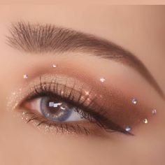 Nye Rave Makeup, Glittery Bridal Makeup, Makeup With Gems Rhinestones, Simple Concert Makeup, Bronze Eyeshadow Looks, Simple Rhinestone Makeup, Dama Makeup, Eye Makeup With Rhinestones, Gala Makeup