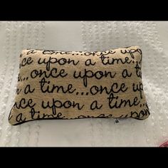 a pillow that has writing on it