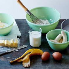 eggs, butter and other ingredients are sitting on a table