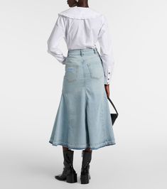 High-rise denim midi skirt in blue - Ganni | Mytheresa Fitted Cotton Denim Skirt With Five Pockets, Trendy Midi Length Denim Skirt, Chic Wide Leg Cotton Denim Skirt, Trendy Spring Denim Midi Skirt, Chic Cotton Denim Skirt For Spring, Trendy Midi Denim Skirt For Spring, Trendy Midi-length Denim Skirt For Spring, Chic Skirt With Frayed Hem For Spring, Chic Long Skirt With Frayed Hem