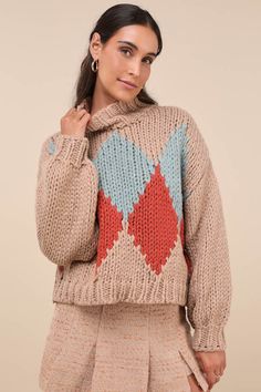 As the snow falls, cozy up in the Little Lies Cabin Cuteness Taupe Multi Diamond Pattern Pullover Sweater! Chunky, cotton-blend knit shapes a darling, multicolored diamond pattern, framed by long sleeves with drop shoulders and fitted cuffs. Relaxed bodice has a mock neckline and a lightly cropped hem. Ribbed knit at neckline, cuffs, and hem. Fit: This garment fits true to size. Length: Size small/medium measures 21" from shoulder to hem. Bust: Great for any cup size. Waist: Not Fitted - comfortable room throughout midsection. Undergarments: May be worn with any standard bra. Fabric: Fabric is very stretchy. Unlined. 65% Cotton, 35% Viscose. Cold Water Wash With Similar Colours. Do Not Bleach. Dry Cleanable. Do Not Tumble Dry. Imported. Lulus | Cabin Cuteness Taupe Multi Diamond Pattern Pu Cozy Argyle Pattern Long Sleeve Sweater, Cozy Long Sleeve Argyle Sweater, Winter Argyle Knit Sweater, Winter Argyle Pattern Tops, Knit Sweater With Argyle Pattern And Long Sleeves, Cozy Multicolor Turtleneck Sweater, Snow Falls, Sweater Chunky, Mock Neckline