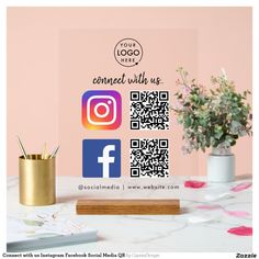 an instagram ad for social media is displayed on a table next to a potted plant