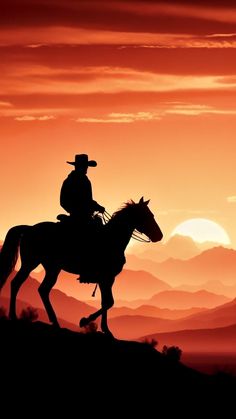 a man riding on the back of a horse in front of an orange sky at sunset