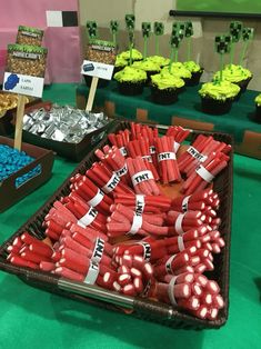 cupcakes and candy are on display at a party